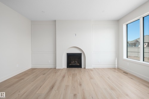 157 Graybriar Drive, Stony Plain, AB - Indoor Photo Showing Other Room With Fireplace
