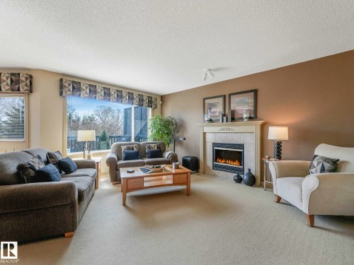 1361 Breckenridge Drive, Edmonton, AB - Indoor Photo Showing Living Room With Fireplace