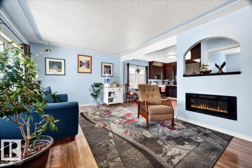 12944 128 Street, Edmonton, AB - Indoor Photo Showing Living Room With Fireplace