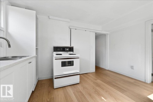 12944 128 Street, Edmonton, AB - Indoor Photo Showing Kitchen With Double Sink