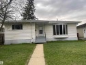 Single-story residence featuring white horizontal siding and a gray shingle roof - 13804 132 Avenue, Edmonton, AB  - Outdoor 