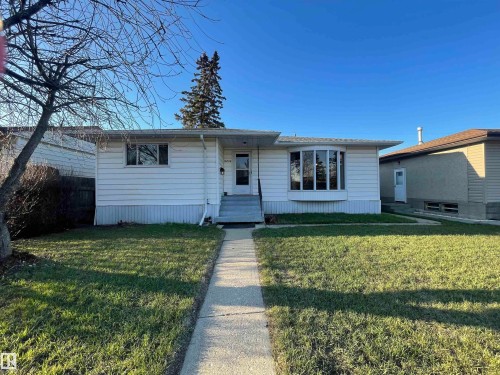 Single-story residence featuring white siding and a prominent bay window - 13804 132 Avenue, Edmonton, AB - Outdoor