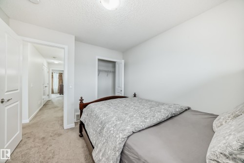 Bedroom featuring neutral-toned carpet, light gray wall paint, and white trim - 4609 Alwood Way, Edmonton, AB - Indoor Photo Showing Bedroom