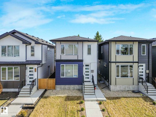 Modern two-story residence featuring a blue and white facade - 15731 109 Avenue, Edmonton, AB - Outdoor With Facade