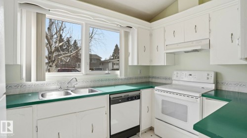 9834 167A Avenue, Edmonton, AB - Indoor Photo Showing Kitchen With Double Sink