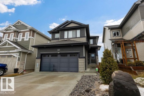 1057 Coopers Hawk Link, Edmonton, AB - Outdoor With Facade