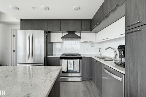 1605 9720 106 Street, Edmonton, AB - Indoor Photo Showing Kitchen With Stainless Steel Kitchen With Double Sink With Upgraded Kitchen