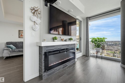 1605 9720 106 Street, Edmonton, AB - Indoor Photo Showing Living Room With Fireplace