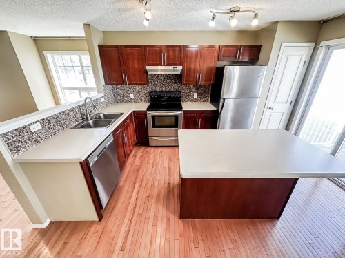101 2051 Towne Centre Boulevard, Edmonton, AB - Indoor Photo Showing Kitchen With Double Sink