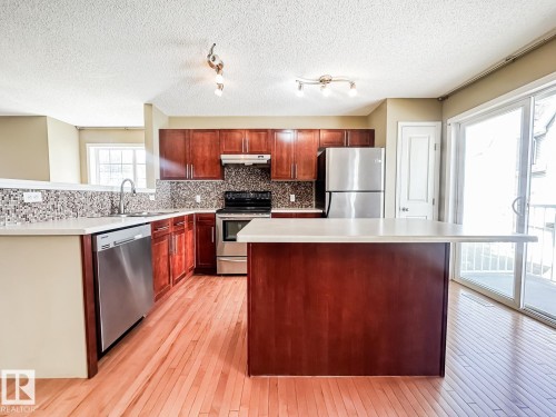 101 2051 Towne Centre Boulevard, Edmonton, AB - Indoor Photo Showing Kitchen With Double Sink
