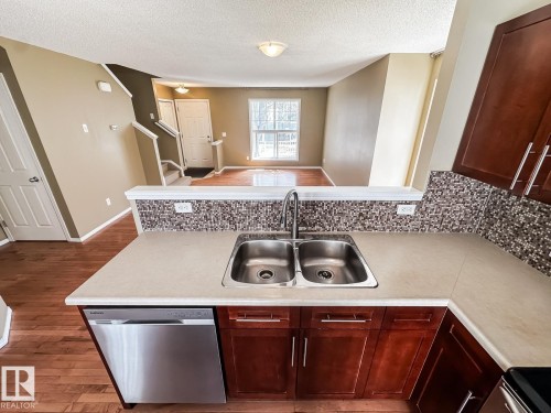 101 2051 Towne Centre Boulevard, Edmonton, AB - Indoor Photo Showing Kitchen With Double Sink