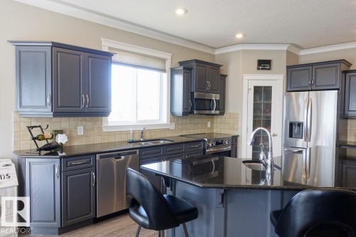 243 Greenfield Way, Fort Saskatchewan, AB - Indoor Photo Showing Kitchen With Double Sink
