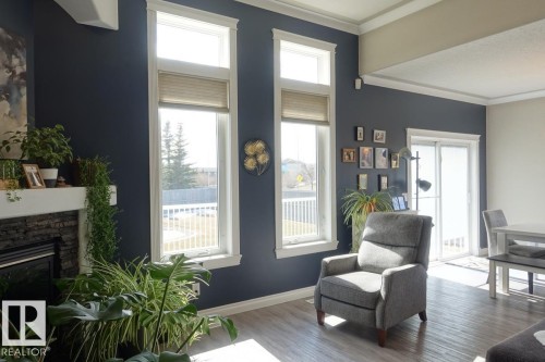 243 Greenfield Way, Fort Saskatchewan, AB - Indoor Photo Showing Living Room With Fireplace