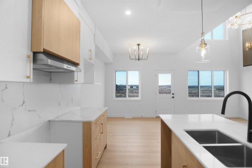 119 Peirwyck Loop, Spruce Grove, AB - Indoor Photo Showing Kitchen With Double Sink