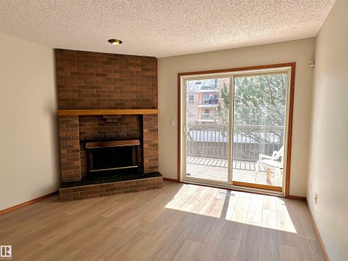11111 157 Avenue, Edmonton, AB - Indoor Photo Showing Living Room With Fireplace
