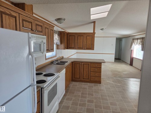 11 Midland Road, Millet, AB - Indoor Photo Showing Kitchen With Double Sink