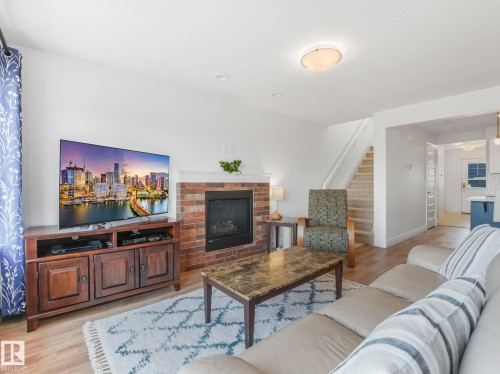 3843 Robins Crescent, Edmonton, AB - Indoor Photo Showing Living Room With Fireplace