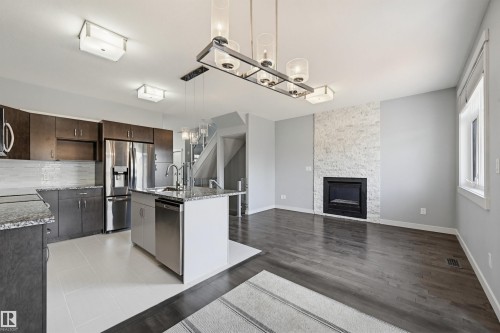 8834 91 Street, Edmonton, AB - Indoor Photo Showing Kitchen With Fireplace