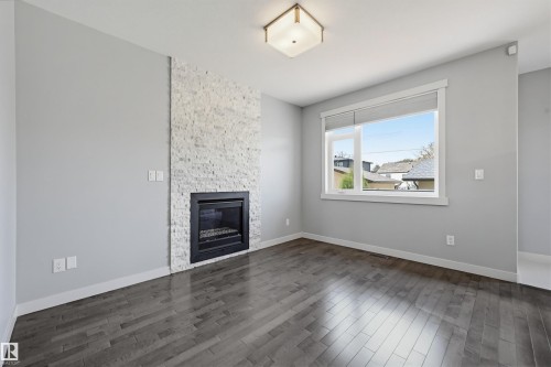 8834 91 Street, Edmonton, AB - Indoor Photo Showing Living Room With Fireplace