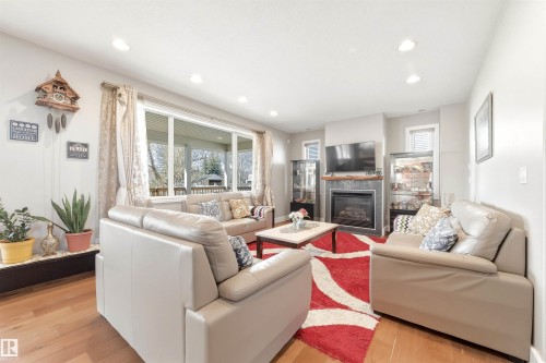 1145 Lincoln Crescent, Edmonton, AB - Indoor Photo Showing Living Room With Fireplace