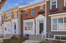 Brick and siding exterior featuring white trim accents - 481 Sheppard Boulevard, Leduc, AB  - Outdoor With Facade 