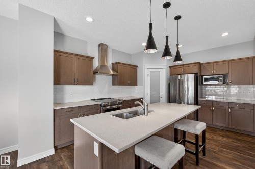 242 Cranberry Bend, Fort Saskatchewan, AB - Indoor Photo Showing Kitchen With Double Sink With Upgraded Kitchen
