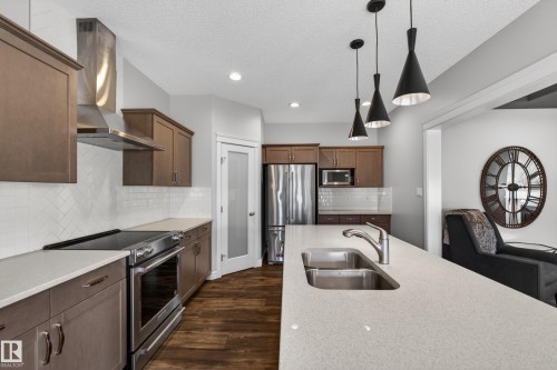 242 Cranberry Bend, Fort Saskatchewan, AB - Indoor Photo Showing Kitchen With Double Sink With Upgraded Kitchen