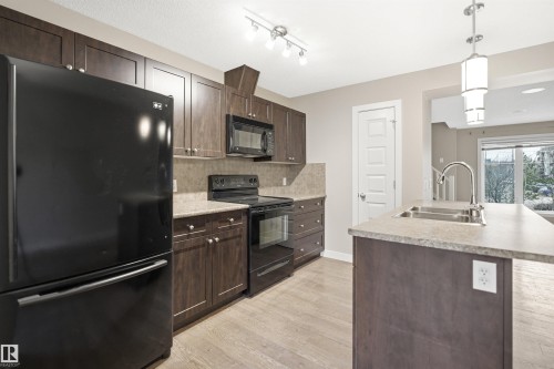 1780 Cunningham Wy, Edmonton, AB - Indoor Photo Showing Kitchen With Double Sink