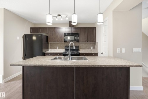 1780 Cunningham Wy, Edmonton, AB - Indoor Photo Showing Kitchen With Double Sink With Upgraded Kitchen