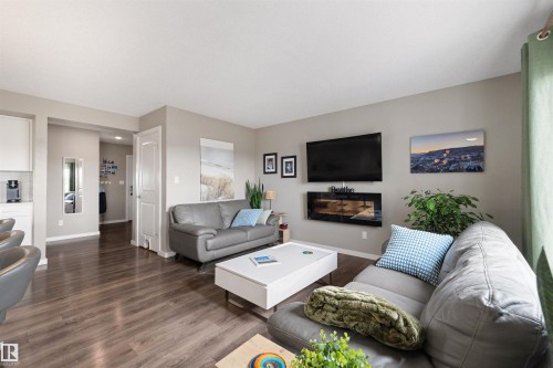 6517 57 Avenue, Beaumont, AB - Indoor Photo Showing Living Room With Fireplace