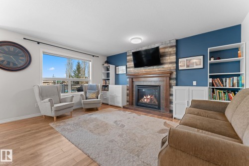 132 Selkirk Place, Leduc, AB - Indoor Photo Showing Living Room With Fireplace