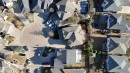 Aerial perspective showcasing a residential cul-de-sac with multiple properties - 2408 Tegler Green, Edmonton, AB  -  With View 