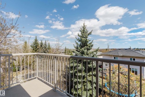 Outdoor balcony with metal railings and a textured floor - 2408 Tegler Green, Edmonton, AB - Outdoor With Balcony With View
