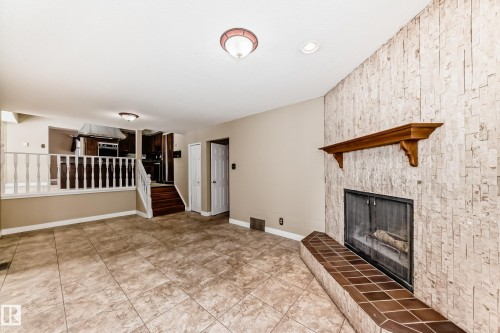 Oak Mantel above the fireplace. - 38 Lancaster Crescent, St. Albert, AB - Indoor With Fireplace