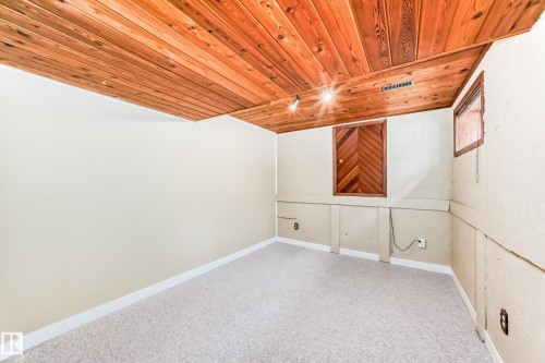 Features 3 side windows and 2 electrical boxes, one on the wall as seen and the other in the utility room. - 38 Lancaster Crescent, St. Albert, AB - Indoor Photo Showing Other Room