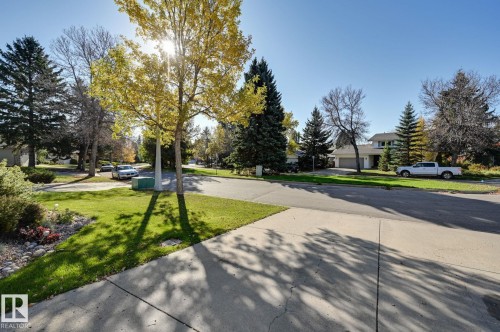 Garage drive way and view of the street. Perfect for children to ride a bike or play out front. - 38 Lancaster Crescent, St. Albert, AB - Outdoor