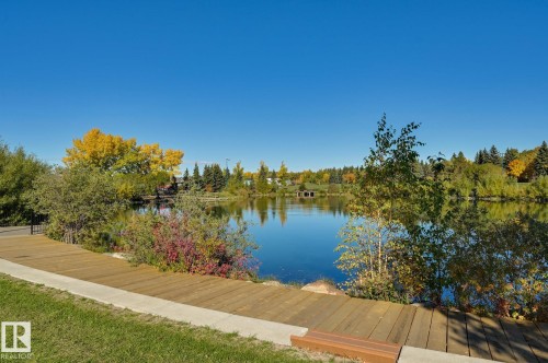 Lake 5 min from the home, fish, picnic, hike, skate. Public restroom and dressing  room on that site. - 38 Lancaster Crescent, St. Albert, AB - Outdoor With Body Of Water With View