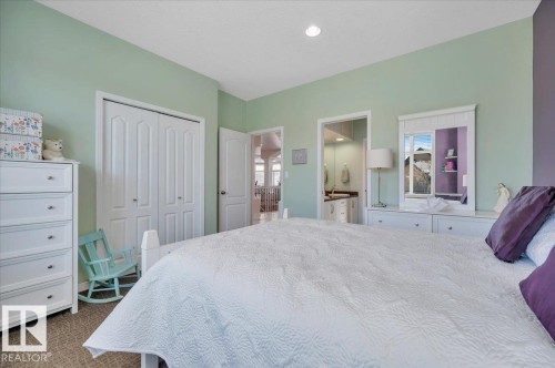ONE OF 2 MAIN FLOOR BEDROOMS - 314 Weaver Point(E), Edmonton, AB - Indoor Photo Showing Bedroom