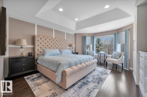 HARDWOOD FLOORING AND STUNNING BACK YARD AND RAVINE VIEWS - 314 Weaver Point(E), Edmonton, AB - Indoor Photo Showing Bedroom