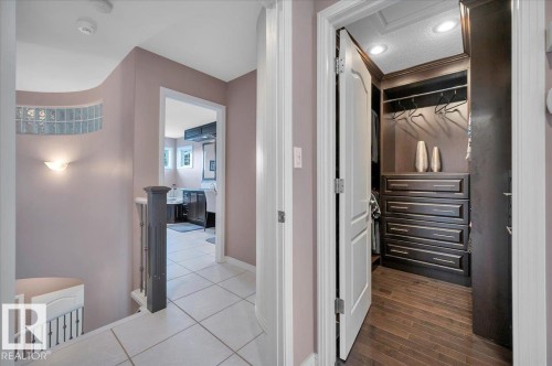 CUSTOM PRIMARY WALK IN CLOSET - 314 Weaver Point(E), Edmonton, AB - Indoor Photo Showing Other Room