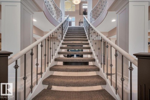 SPECTACULAR STAIRCASE FROM THE MAIN TO LOWER LEVEL - 314 Weaver Point(E), Edmonton, AB - Indoor Photo Showing Other Room