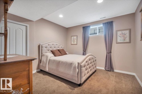 SECOND OF 2 LOWER LEVEL BEDROOMS - 314 Weaver Point(E), Edmonton, AB - Indoor Photo Showing Bedroom