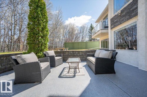 LOWER LEVEL PATIO WITH STONE RETAINING WALL - 314 Weaver Point(E), Edmonton, AB - Outdoor With Exterior
