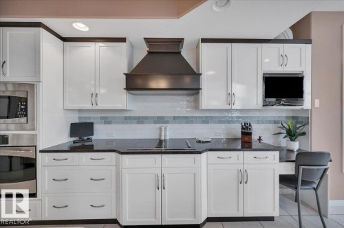 RENOVATED KITCHEN WITH JENN AIR DOWN DRAFT ELECTRIC COOKTOP - 314 Weaver Point(E), Edmonton, AB - Indoor Photo Showing Kitchen