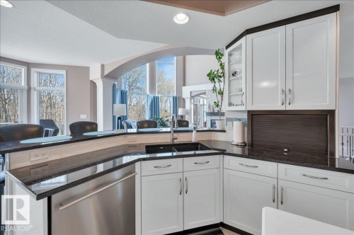 GRANITE COUNTERS, BLOMBERG DISHWASHER AND SILGRANITE DUAL SINK - 314 Weaver Point(E), Edmonton, AB - Indoor Photo Showing Kitchen With Double Sink