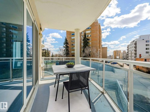 Private balcony with glass panel railings - 305 10504 99 Avenue, Edmonton, AB - Outdoor With Balcony