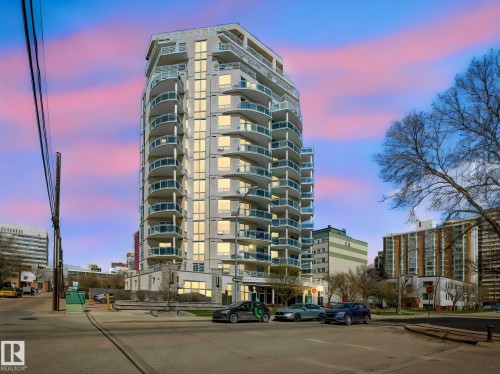 Contemporary high-rise building featuring multiple levels of private balconies with glass railings - 305 10504 99 Avenue, Edmonton, AB - Outdoor With Balcony