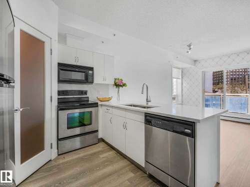 Image quality insufficient for description - 305 10504 99 Avenue, Edmonton, AB - Indoor Photo Showing Kitchen With Double Sink