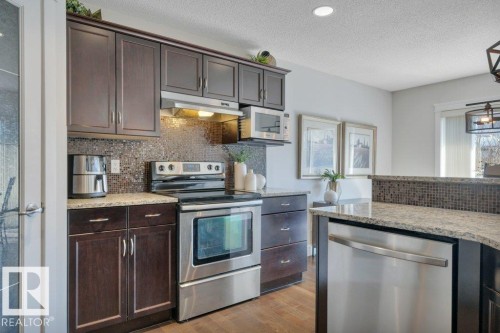 13 Selkirk Place, Leduc, AB - Indoor Photo Showing Kitchen With Stainless Steel Kitchen