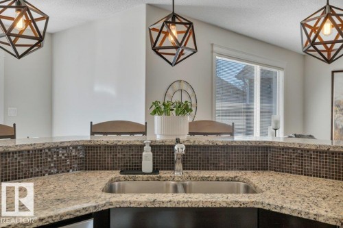 13 Selkirk Place, Leduc, AB - Indoor Photo Showing Kitchen With Double Sink With Upgraded Kitchen